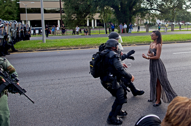 Evans’s arrest from another angle. Photo via AP.
